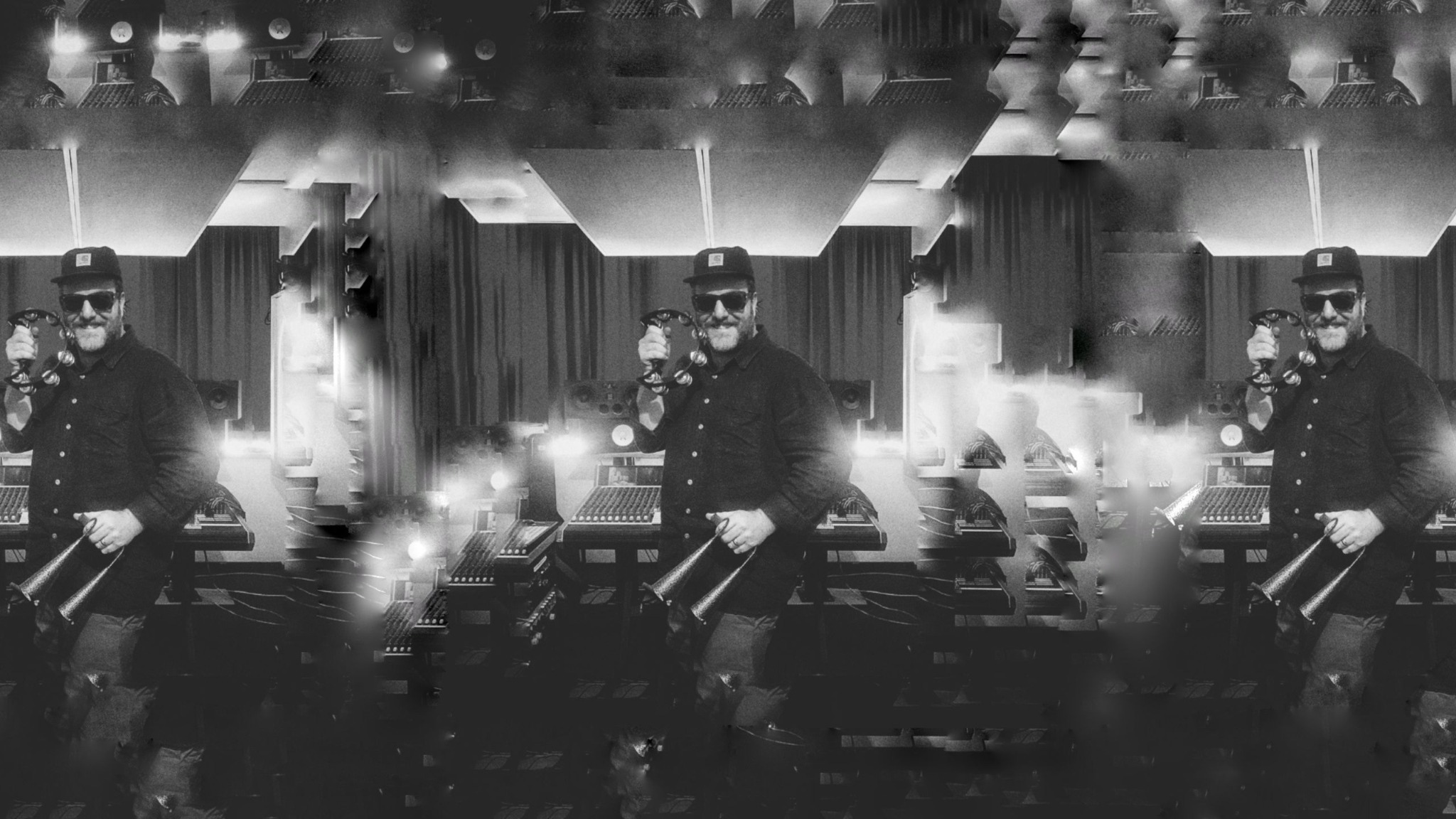 Ed Temple in the studio with analogue music equipment